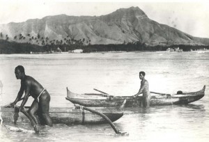 Outrigger canoes at Waikiki Beach, late 1800s.    