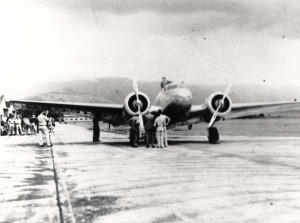 Amelia Earhart arrives at Wheeler Field, Oahu, aboard her twin engine Lockheed Electra on the first leg of her east to west trip around the world flight, March 18, 1937.
