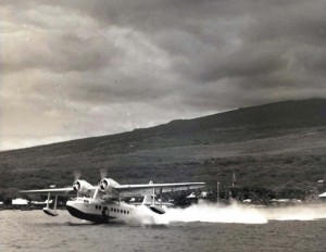 Inter-Island Airways. U.S. mail plane takes off from historic Kailua Bay, on the Big Island.