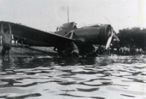 A-12 being removed from Haleiwa Bay after a forced landing. The pilot was Ssgt. Charlie Cunningham. The gunner was PFC Johnny DiLauro. Both survived. Only the guns were damaged. July 19, 1938.