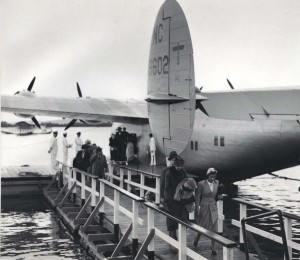 Fifteen hours after departing San Francisco, 25 passengers disembark from Pan American's California Clipper at Honolulu marking the end of the 2,400 mile inaugural flight of the giant Boeing plane with a payload of passengers.  