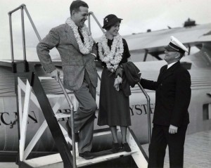 November 1930--First Trans-Pacific honeymooners arrive in Honolulu. Mr. and Mrs. George Cruse of New York are greeted by Pan American Capt R.O.H. Sullivan for a happy flight. The bride was airline hostess for three years before her marriage.