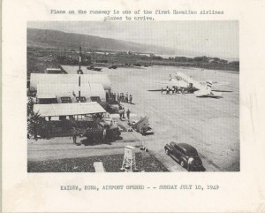 Plane on the runway is one of the first Hawaiian Airlines planes to arrive at Kailua, Kona Airport on its opening day, July 10, 1949. 