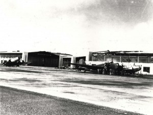 B-18 parked in front of Hangar 13 at Hickam Field with B-17 on the left near Hangar 17, December 17, 1941.