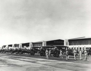 Douglas B-18 Bolo Bombers and Boeing P-26 and P-12E aircraft parked on flight line at Hickam Field, 1940. 