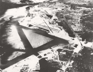 Naval Air Station Honolulu (John Rodgers Airport), April 1945. Note seaplane runways for flying boats like "Mars". Also seen are Hickam AFB runways.