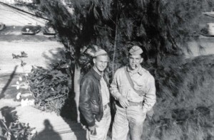 Lt. P. L. Renaison and Lt. Joe Rulley standing on steps of Officer's Building at Bellows Field, 1942.        
