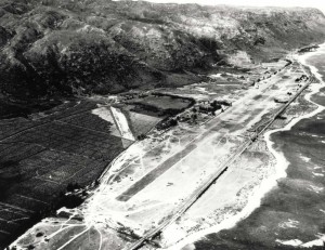 P-40s in lower foreground are decoys at Mokuleia Field, Oahu, August 1942. 
