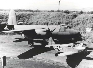 Culver PQ-8A radio controlled airplane assigned to 17th Tow Target Squadron at Wheeler Field, March 1944. It resembles a toy alongside a Martin B-26 Marauder.  