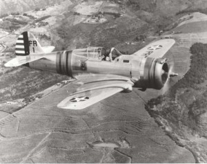 P-36A With 18th Pursuit Group emblem on fuselage, in flight over sugar cane fields on Oahu. Stationed at Wheeler Field. February 15, 1940  