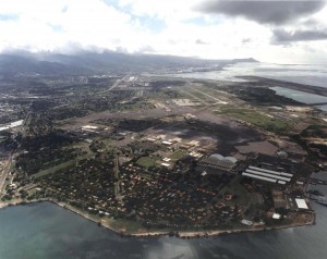 Hickam Air Force Base Hawaii, with Honolulu International Airport and the Reef Runway in the background, 1986.  