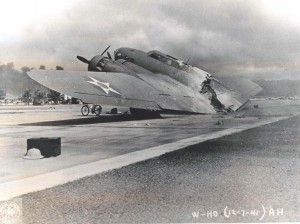 Historic photo of a plane crash on the runway of Hickam Field taken in 1941