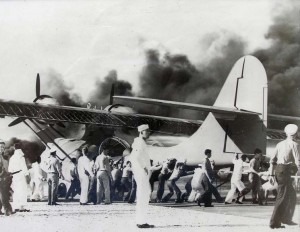 Historic photo of an aircraft engine catching fire on the runway at Kaneohe Naval Air Station