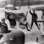 Historic photos of pilots on an airplane