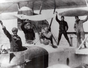 Historic photos of pilots on an airplane