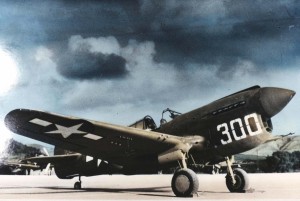 P-40 with Winnie LaVerne at controls on Bellows Field flight line, 1943.