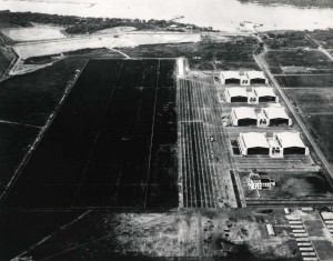 Location of tent city at Hickam Field is clearly shown (lower right hand corner). Base Operations and first four hangars have been completed. Bishop Point dock and submarine net pier are in place and Hangar Avenue extends to Bishop Point, March 31, 1938. 