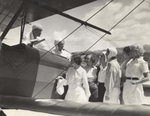 Flying Instructor Olean V. Andrew April 13, 1935. Pilot Andrews, Evelyn Hudson, assistant instructor; Winifred Hudson, Helen Smith, Virginia Thomas, Madeline Hayden, Emma Chung, Clora Curtis.