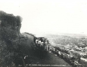 A scenic view of Waikiki from high up on Puowaina Drive, Punchbowl, Honolulu, provided for a leisure drive in the early 1900s.    