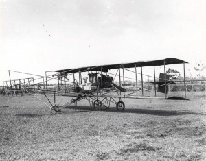 Mason Didier, French Aviator, Poses on his bi-plane before taking off from Leilehua (Schofield Barracks Field) on June 22, 1911. He later crashed.    