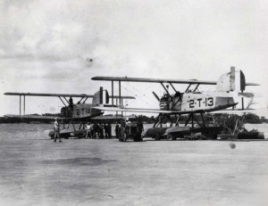 Two Douglas torpedo planes are towed to the water's edge at Pearl Harbor, May 15, 1924. 
