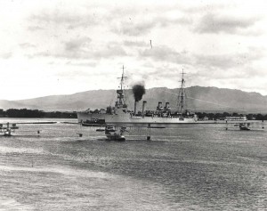 Three F5Ls at anchor with USS Omaha and testing torpedo barge in background at Pearl Harbor Fokker harbor, July 1, 1925. 