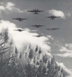 Planes in flight formation over Oahu, c1920s.
