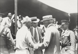 Dole Derby attendees James B. Dole, Governor Wallace R. Farrington, and Albert P. Taylor. 