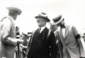 Dole Derby organizer James B. Dole and Clarence Cook watching the landing of Art Goebel's plane at Wheeler Field, August 17, 1927. 