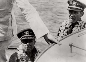 Commander John Rodgers, left, and B. J. Connell, right, are shown leaving Nawiliwili Harbor on Kauai on September 11, 1925 for Pearl Harbor.