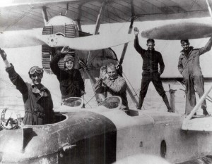 Waving before their departure from San Pablo Bay, John Rodgers (center) and his crew attempted the difficult and dangerous feat of flying over the Pacific Ocean for the first time.  