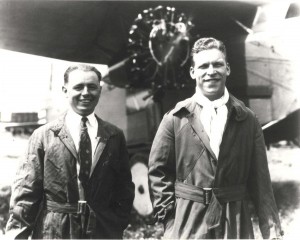 Lts. Albert Hegenberger and Lester Maitland pose in flying togs before the Fokker in which they made the first flight from the Mainland to Hawaii on June 29, 1927. Hegenberger was Chief of the Instrument & Navigation Unit, Materiel Division, Wright Field before the flight.  
