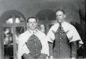 Lts. Hegenberger and Maitland wear the feathered capes of the Hawaii Alii during a ceremony honoring them after their record-setting flight from California to Hawaii on June 29, 1927.  