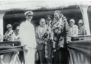 Heaped with lei from well wishers, Lts. Hegenberger and Maitland received a royal send off on July 7, 1929 before boarding the ship that carried them back to the Mainland.  