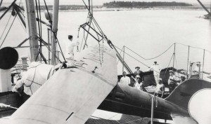 Amelia Earhart's plane was harnessed up by specially constructed slings to lift it from the deck of the Lurline, December 27, 1934.  