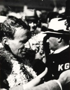 Sir Charles Kingsford Smith at KGU mike is interviewed by the press upon his arrival at Wheeler Field, October 29, 1934. 