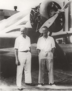 Navigator P.G. Taylor and pilot Sir Charles Kingsford-Smith with their plane, Lady Southern Cross. They were in Honolulu for four days and nights while their aircraft was made ready for flight. They departed Hawaii on November 3, 1934 on the final leg of the first west-east flight across the Pacific. 