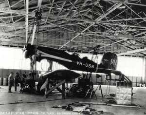 The Lady Southern Cross undergoes repairs at Wheeler Field hangar, November 2, 1934. When Army Air Corps technicians dismantled the fuel system and removed the fuselage tanks, a large crack was found in one tank.