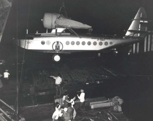 Inter-Island Airways. A Sikorsky S-43 is unloaded at Honolulu Harbor. 