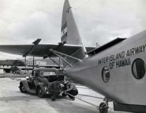 Inter-Island Airways. A Nash is used to tow the world's fastest Sikorsky S-43 amphibian from the dock to John Rodgers Airport after arrival on a freighter at Honolulu Harbor. The eight-mile trip with the nine-ton plane was accomplished with ease.