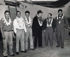 Crew of the Guba flying laboratory plane. Plane is owned by Richard Archibold, right, Standard Oil heir, and was flown from San Diego to Honolulu in 18 hrs 8 min, a new record. 