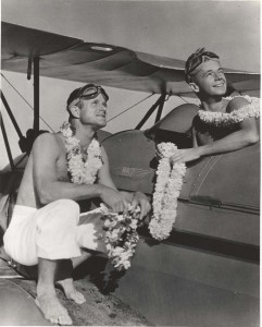William Cross Jr. and Walter Dillingham Jr. dropped flower lei to passengers arriving on liners in Hawaii, April 1935.