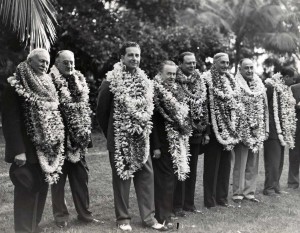 October 1936 Pan American Clipper Passengers receive a lei welcome in Honolulu: Wallace Alexander, Paul Patterson, Cornelius V. Whitney, Roy Howard, William Roth, W. G. McAdoo, Amon G. Carter (publisher Fort Worth Star Telegram), and Juan T. Trippe, president Pan American Airways.  