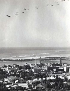 US Army Air Corps December 21, 1934. US service planes in formation over Honolulu honoring the Wright Brothers. The planes later flew out to sea and dropped lei in memory of Capt Charles Ulm and his companions who died attemping to fly beween California and Australia.  