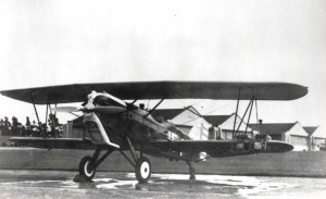 A-3 at Wheeler Field with hangars in background.