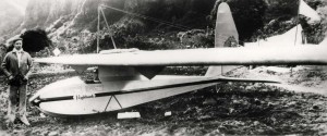 International Glider Meet Dec. 17-18, 1931. Lt. William A. Cocke of Wheeler's 19th Pursuit Squadron stands alongside his "Nighthawk" glider in which he broke the official world record of 14 hours & 7 minutes. Note unofficial 19th Pursuit Squadron insignia on tail of glider.