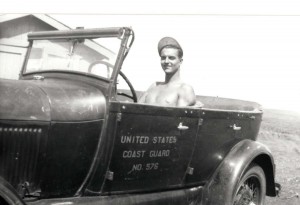 Pvt. Stanley Koenig of Morse Field sits in a 1929 Model A Ford which was used by Mr. Gibson, the lighthouse keeper at South Point, Hawaii, 1941. 