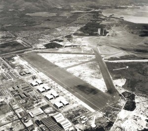 Aerial from 3,000 feet shows completed Diamond Head extension of taxiway. Planes are parked closely together on apron for security since sabotage was considered the greatest threat. Two months later the Japanese aerial attack occurred. October 1, 1941. 