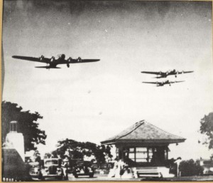 First mass flight of Army bombers departed Hamilton Field, California, on May 13, 1941 and arrived at Hickam Field in 13 hours and 10 minutes. The flight consisted of 21 B-17 bombers like these flying over Hickam's Main Gate.