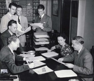 Members of Honolulu Jr. Chamber of Commerce sign up a volunteer for an emergency pilot training course, 1940s.